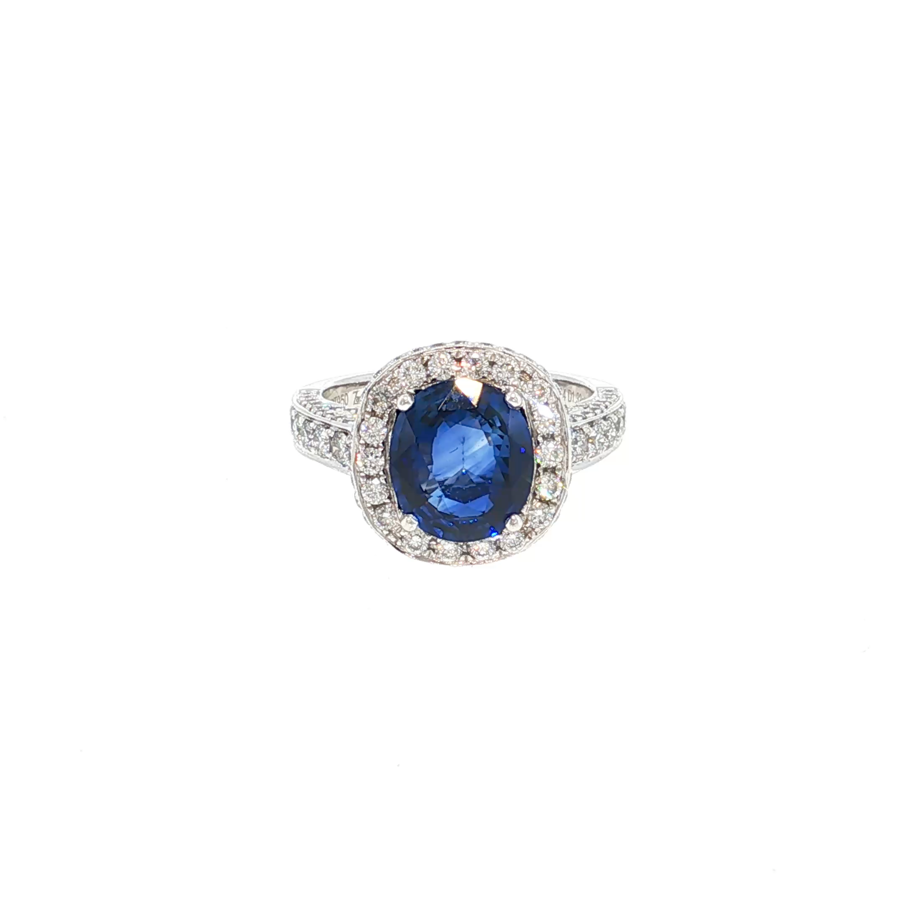 White Gold Plated Silver Cocktail Ring with Deep Blue Oval Sapphire