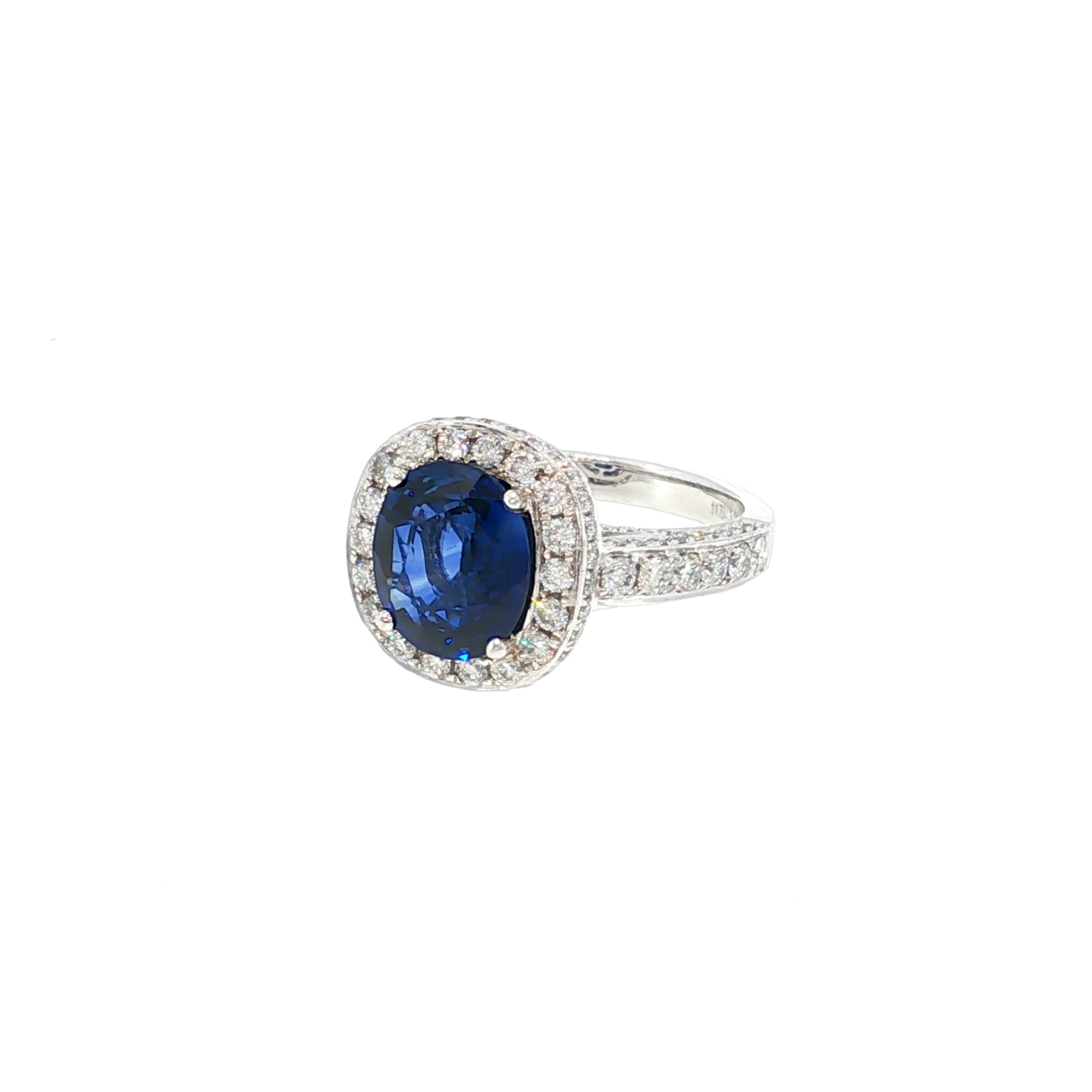 White Gold Plated Silver Cocktail Ring with Deep Blue Oval Sapphire