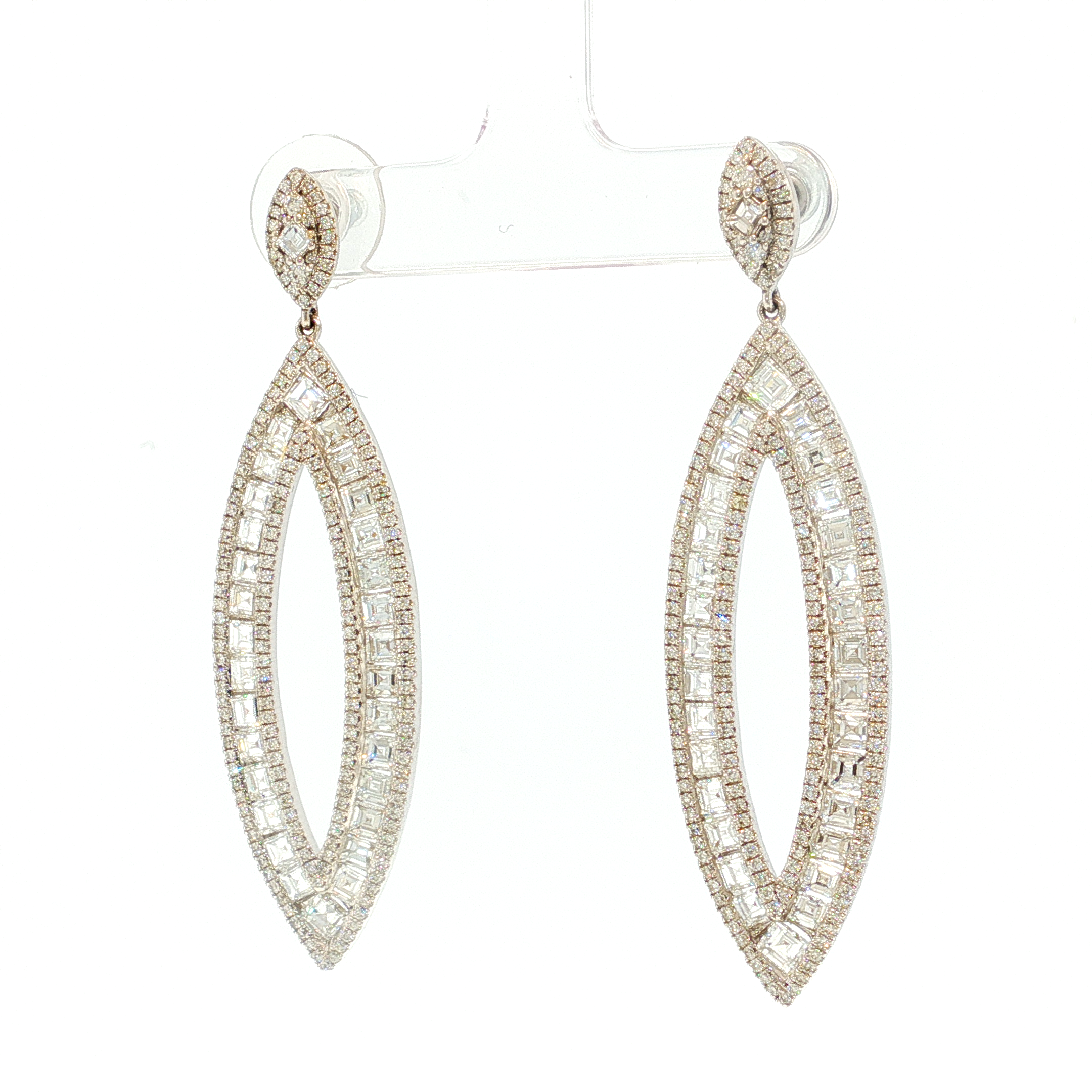 Elegant White Gold Dangle Earrings with Oval Cut Diamonds