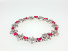 Elegant Silver Tennis Bracelet with Cabochon Ruby Gemstones