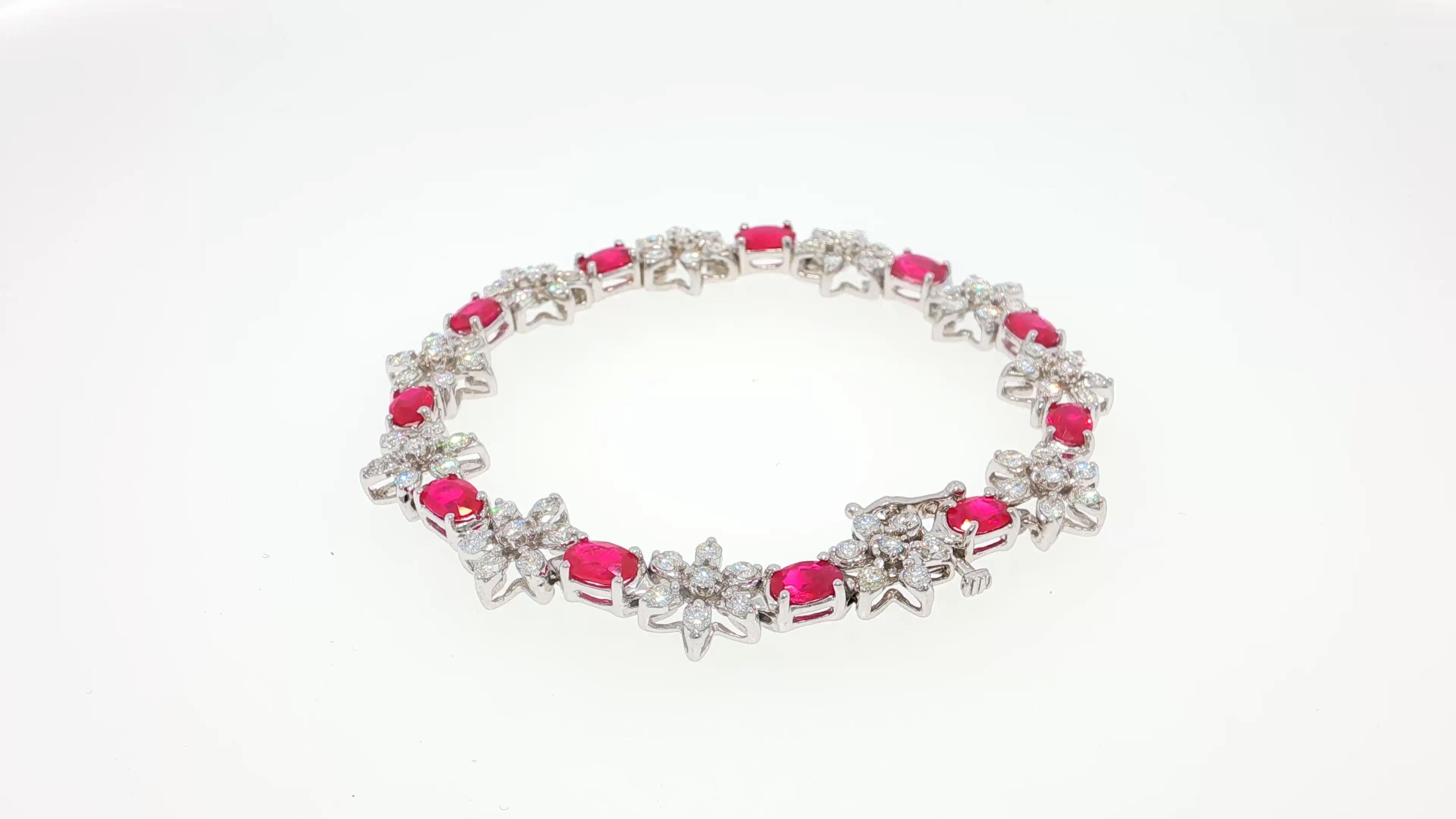 Elegant Silver Tennis Bracelet with Cabochon Ruby Gemstones