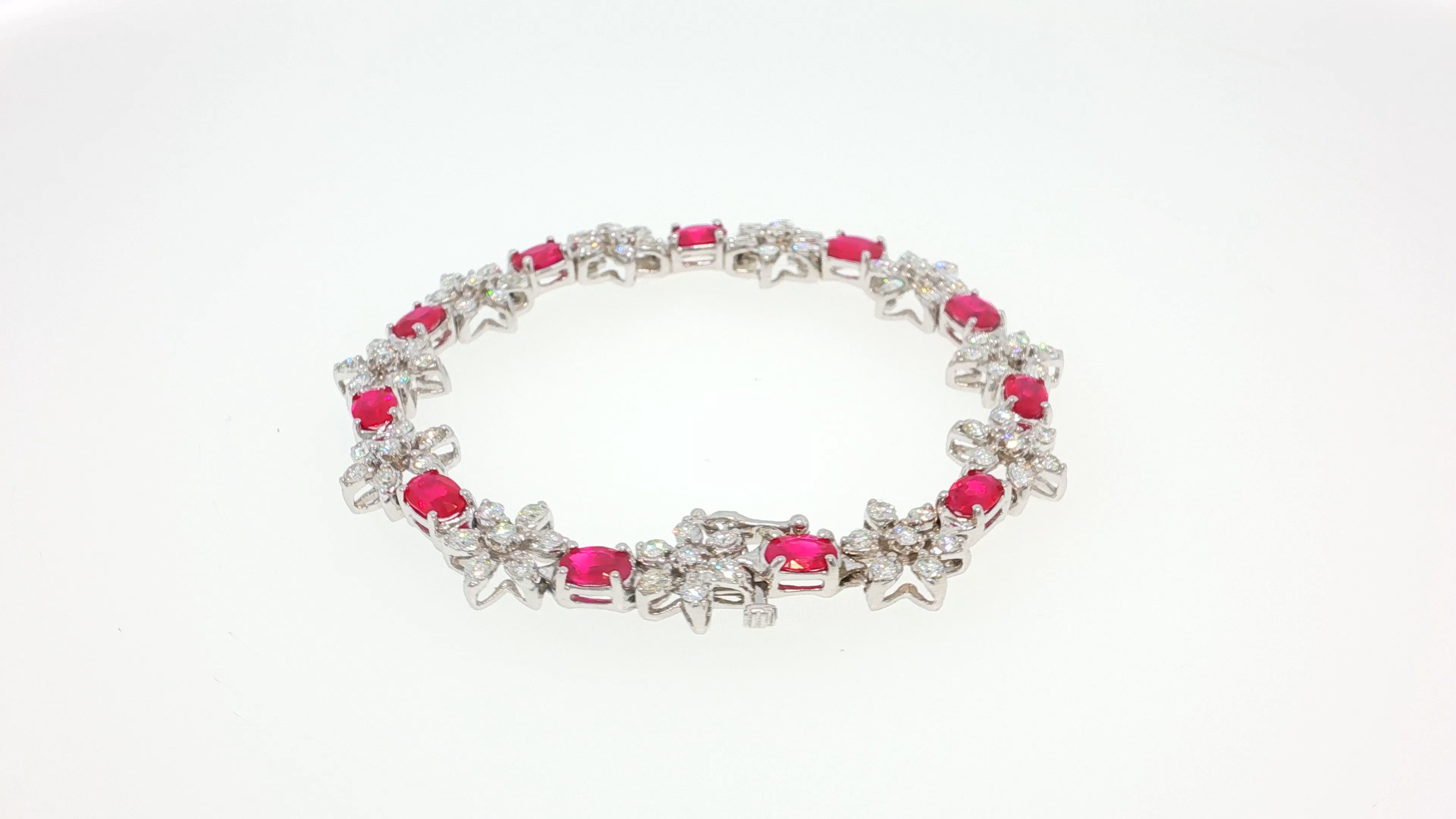 Elegant Silver Tennis Bracelet with Cabochon Ruby Gemstones