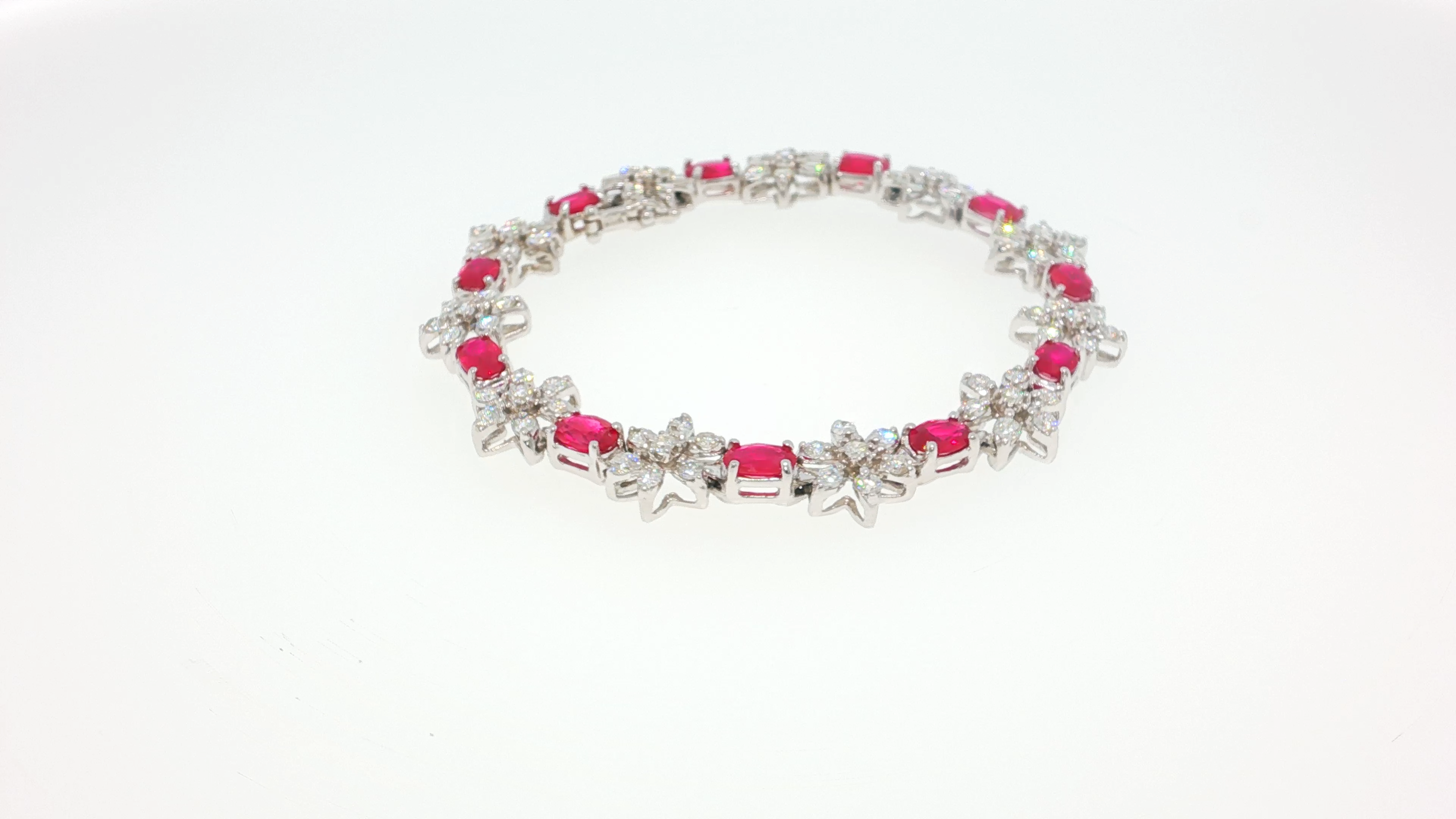 Elegant Silver Tennis Bracelet with Cabochon Ruby Gemstones