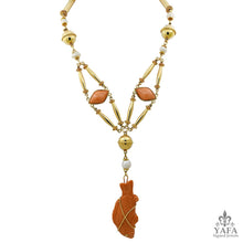 CARTIER Cabochon Carved Coral Fish Necklace