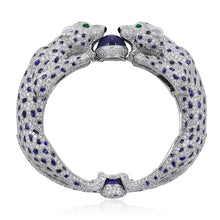 CARTIER Platinum, Diamond and Sapphire Two Panther Head Bangle