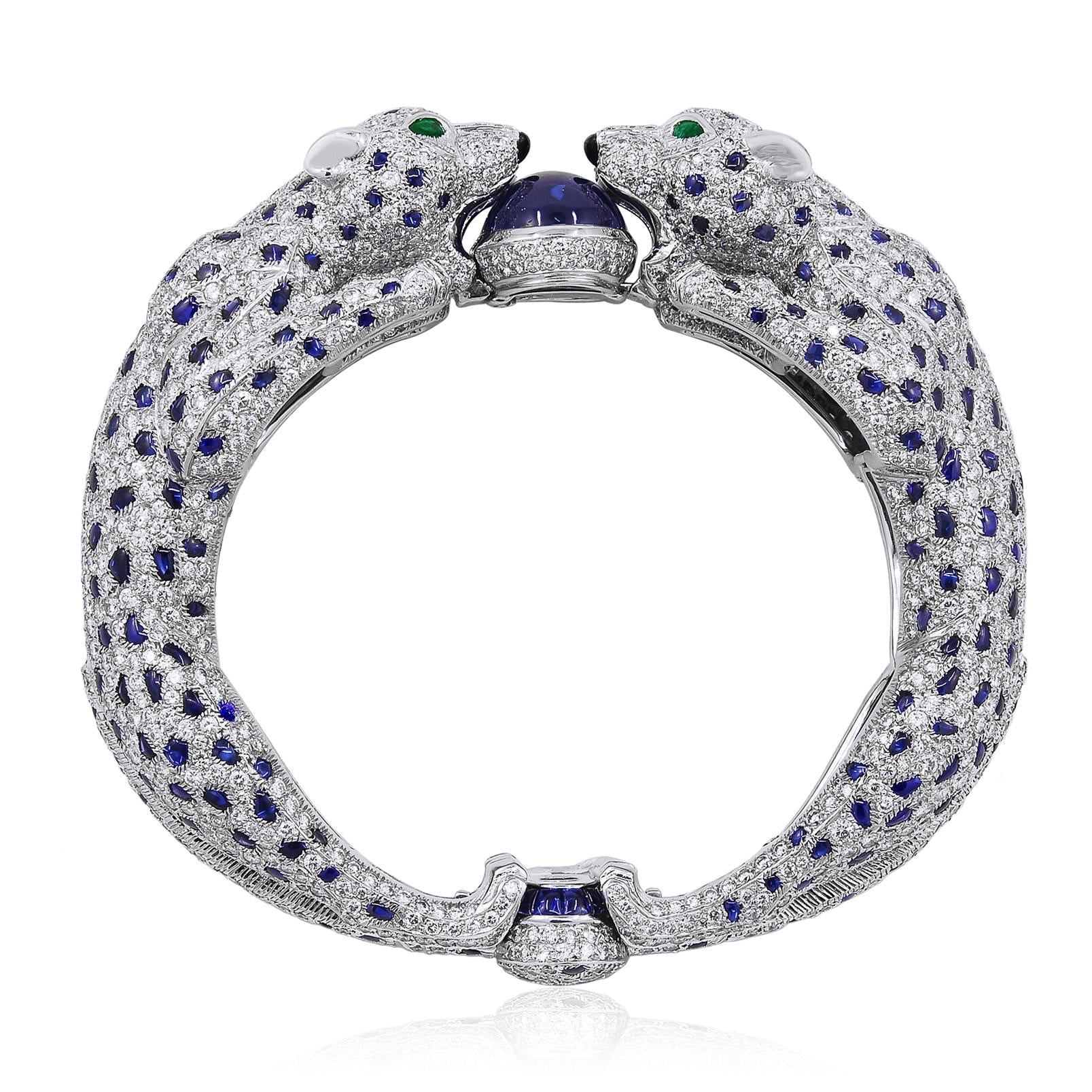 CARTIER Platinum, Diamond and Sapphire Two Panther Head Bangle