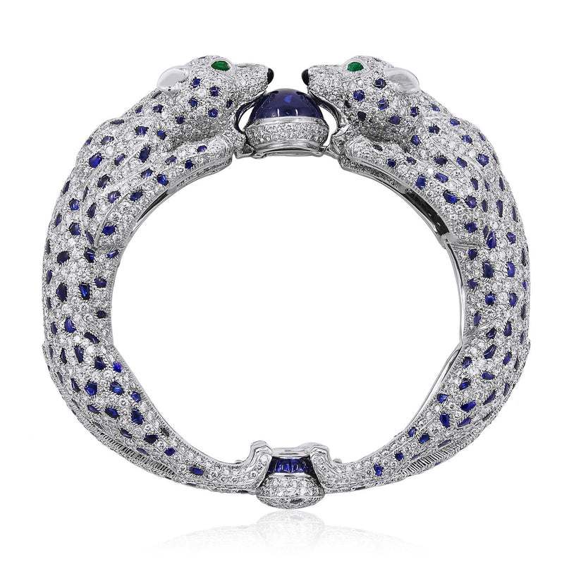 CARTIER Platinum, Diamond and Sapphire Two Panther Head Bangle