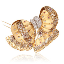 VAN CLEEF & ARPELS  18K Yellow Gold, Diamond and Ruby Bow Brooch