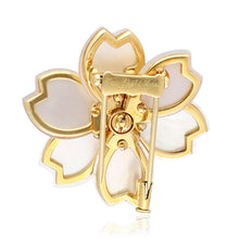VAN CLEEF & ARPELS Diamond and Mother-of-Pearl “Rose de Noël” Brooch