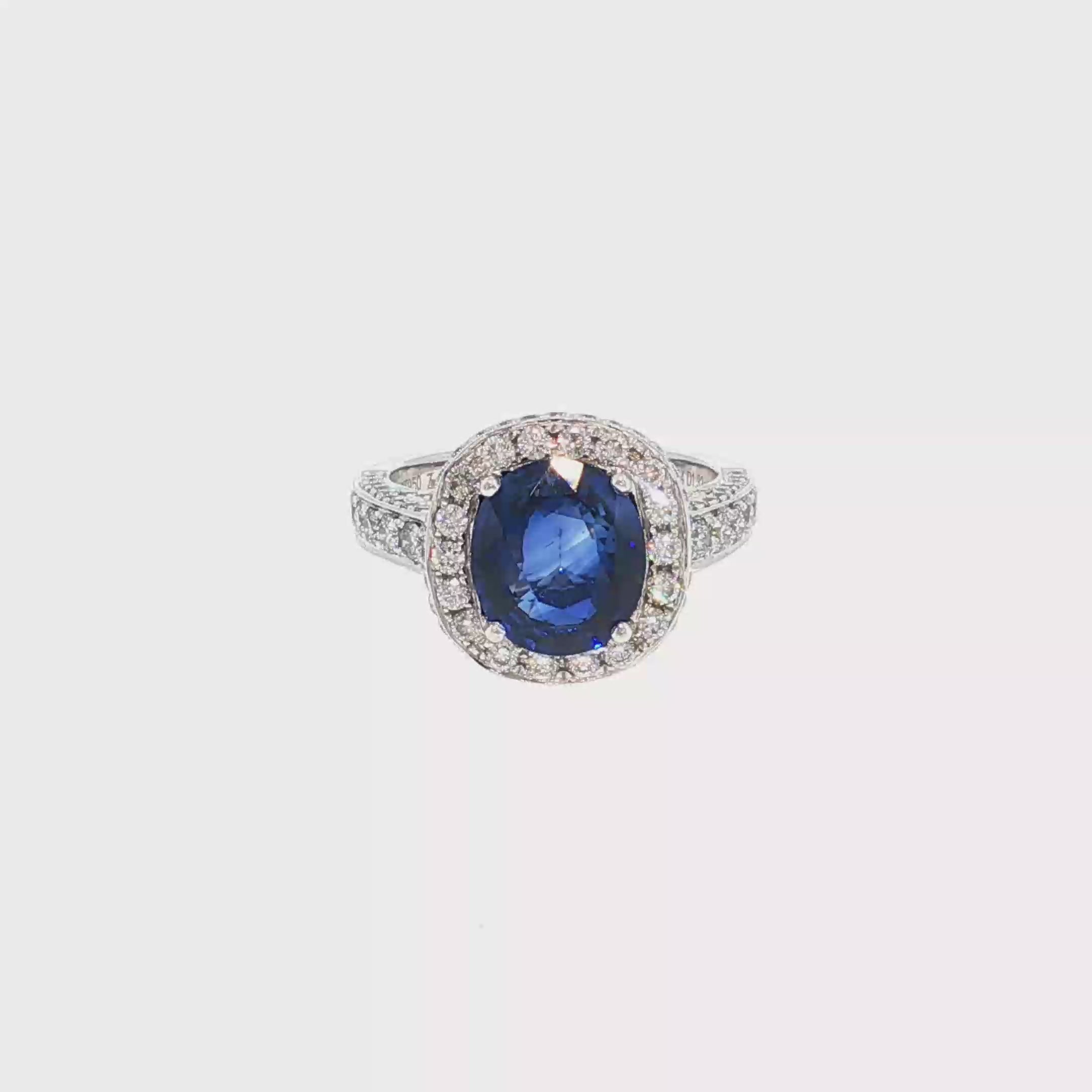 White Gold Plated Silver Cocktail Ring with Deep Blue Oval Sapphire